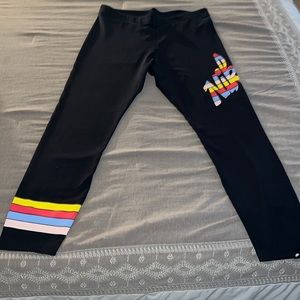 Nike tights size large, may fit smaller like a medium. Black with Nike emblem.